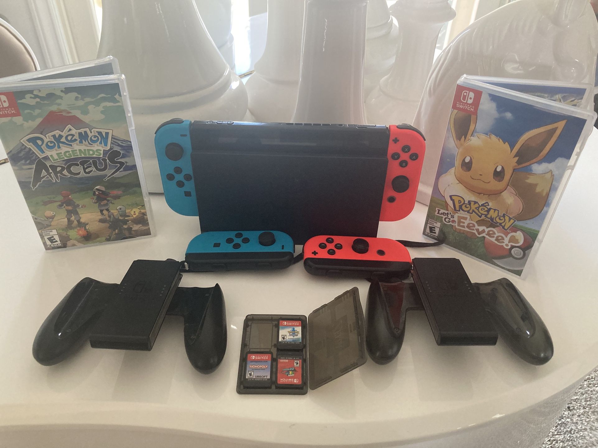 Nintendo Switch Pokémon Bundle - Console, Dock, 4 JoyCons, MicroSD Card, 5 Games and More