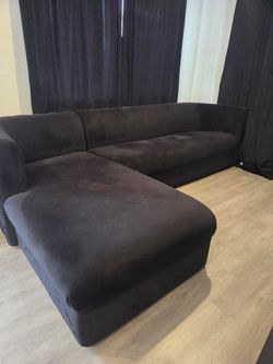 Black velvet sofa