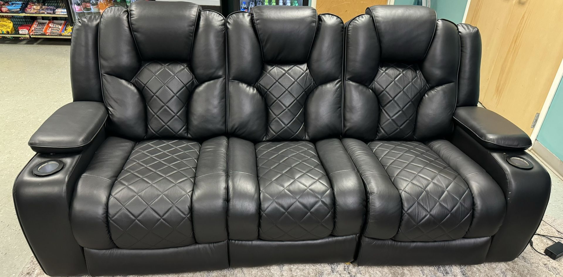 Leather reclining sofa