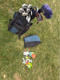 Golf clubs, bag, balls, tees, markers