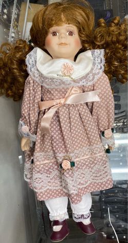 The Greensboro Collection Limited Edition Porcelain Doll named "Hester" with her Certificate of Authenticity in the box.