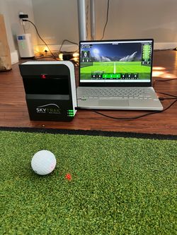 SkyTrak golf launch monitor and protective case