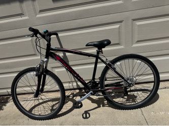 Mountain bike ready to go it needs air in one tire