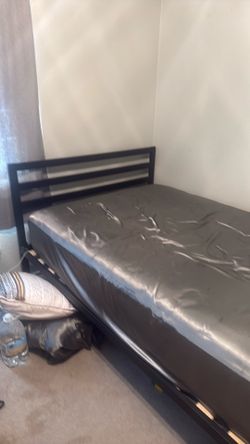 Full size bed with used mattress