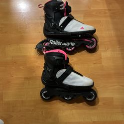 Two Pair Of Rollerblades