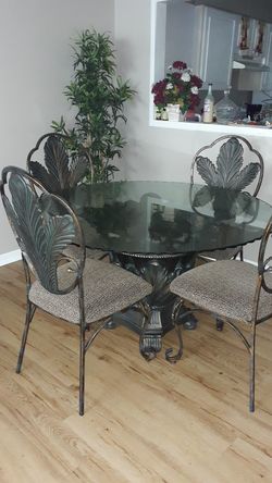 4 seated glass table