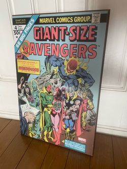 Marvel wall decor on wood  19.5 inches tall / 13 inches wide