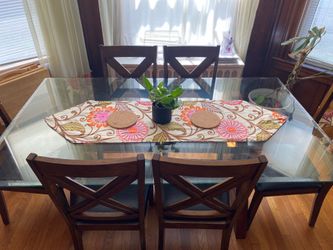 Glass dining table with 6 chairs