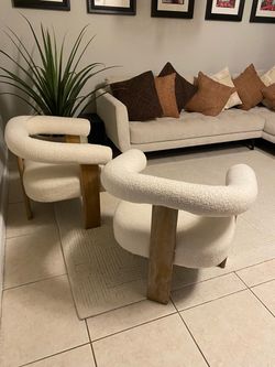 sculpted boucle accent chair set of two $380