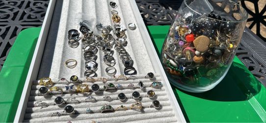 Jar of miscellaneous jewelry