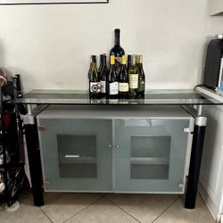 1 Tempered Glass Wine Cabinet / Credenza. And 1 Glass Table With 4 Chairs Included. 