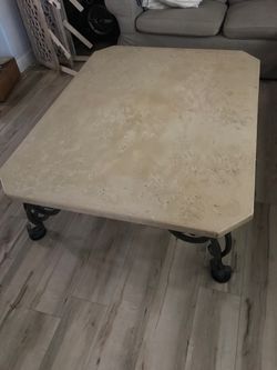 Stone and iron coffee table