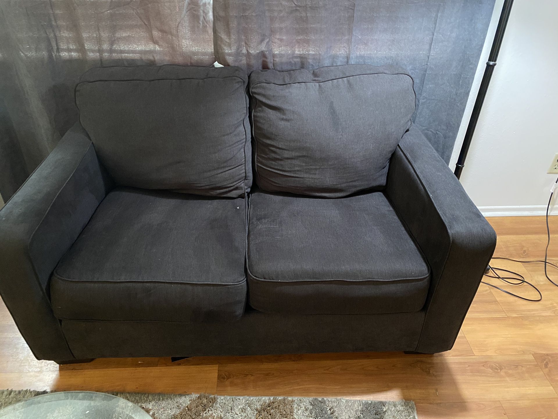 Grey 2 piece love seat and 3 seat couch.