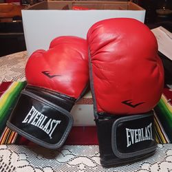 Two Sets Of Boxing Gloves