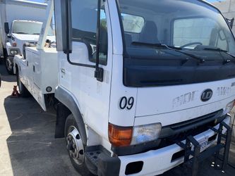 02 Nissan tow truck.