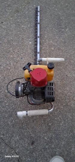 Gas powered hedge clippers.