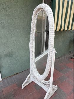 Stand up wicker mirror