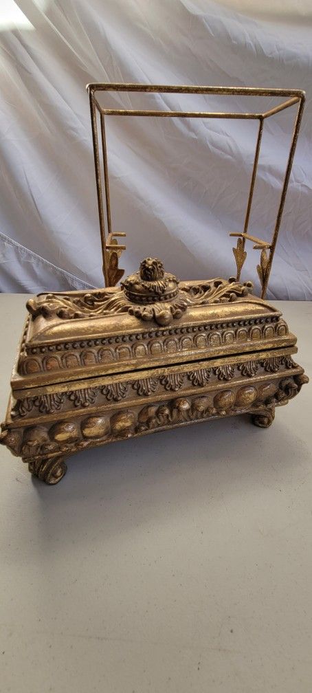 Beautiful Gold Box That Turns Into Little Gold Shelves