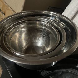 Pots, bowls and a strainer