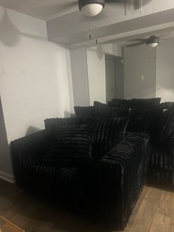 Black Fluffy Ribbed Sofas with Throw Pillows