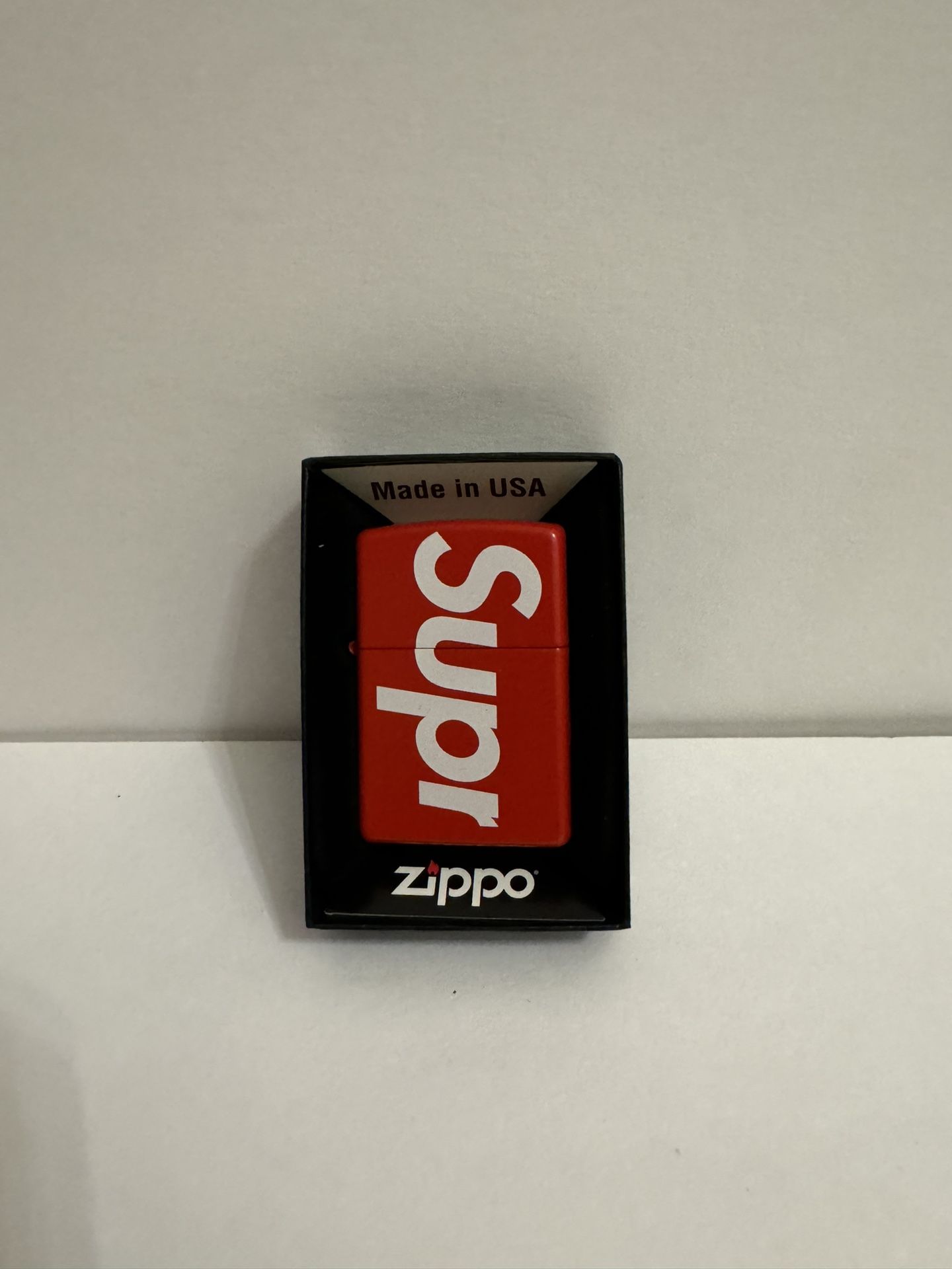 Supreme Zippo