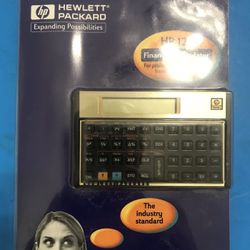 Open box never used  Vintage HP-12C Financial Calculator w/ leather case, manual