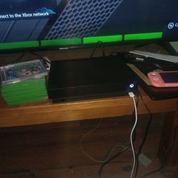 Xbox 1 X With 8 Games 