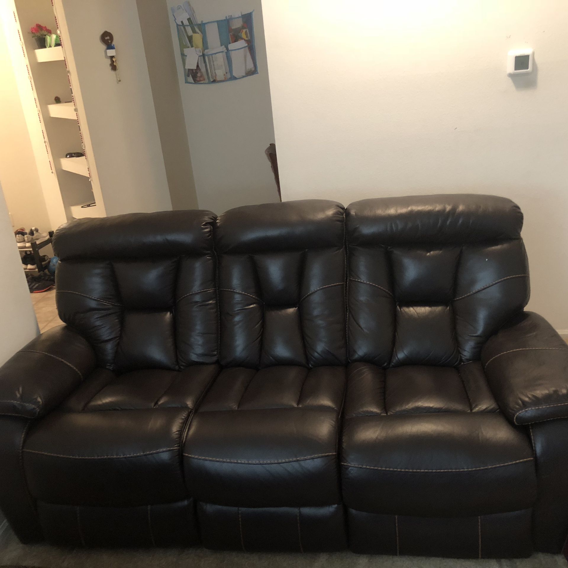 Sofa with two recliners