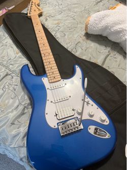 New Fender Stratocaster Electric Guitar and Amp Speaker