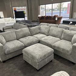 Light Gray Comfy Sectional And Ottoman 