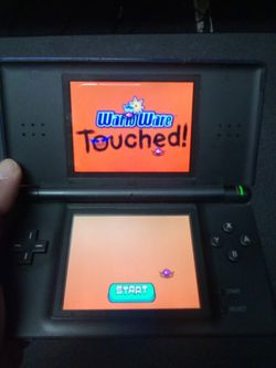 Nintendo Ds Lite With R4 Preloaded Games