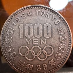 Japanese 1000 Yen silver commemorative coin issued for the 1964 Tokyo Summer Olympic Games. 