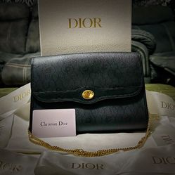 Authentic vintage Dior Black Leather shoulder bag with Gold Accents