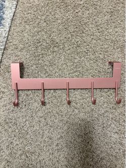 Pink metal over the door hook hanger