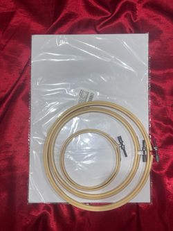 Water-soluble embroidery paper and embroidery hoops