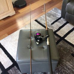 8 ft.  Pflueger Spinning Rod, and Large Shakespeare Alpha Reel