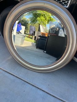 Round champagne beaded wall mirror