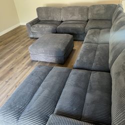 New Corduroy Sectional.  Grey.  127” X 164” X 66”.  Free Delivery!