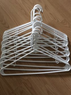 Dozens Of Plastic Hangers