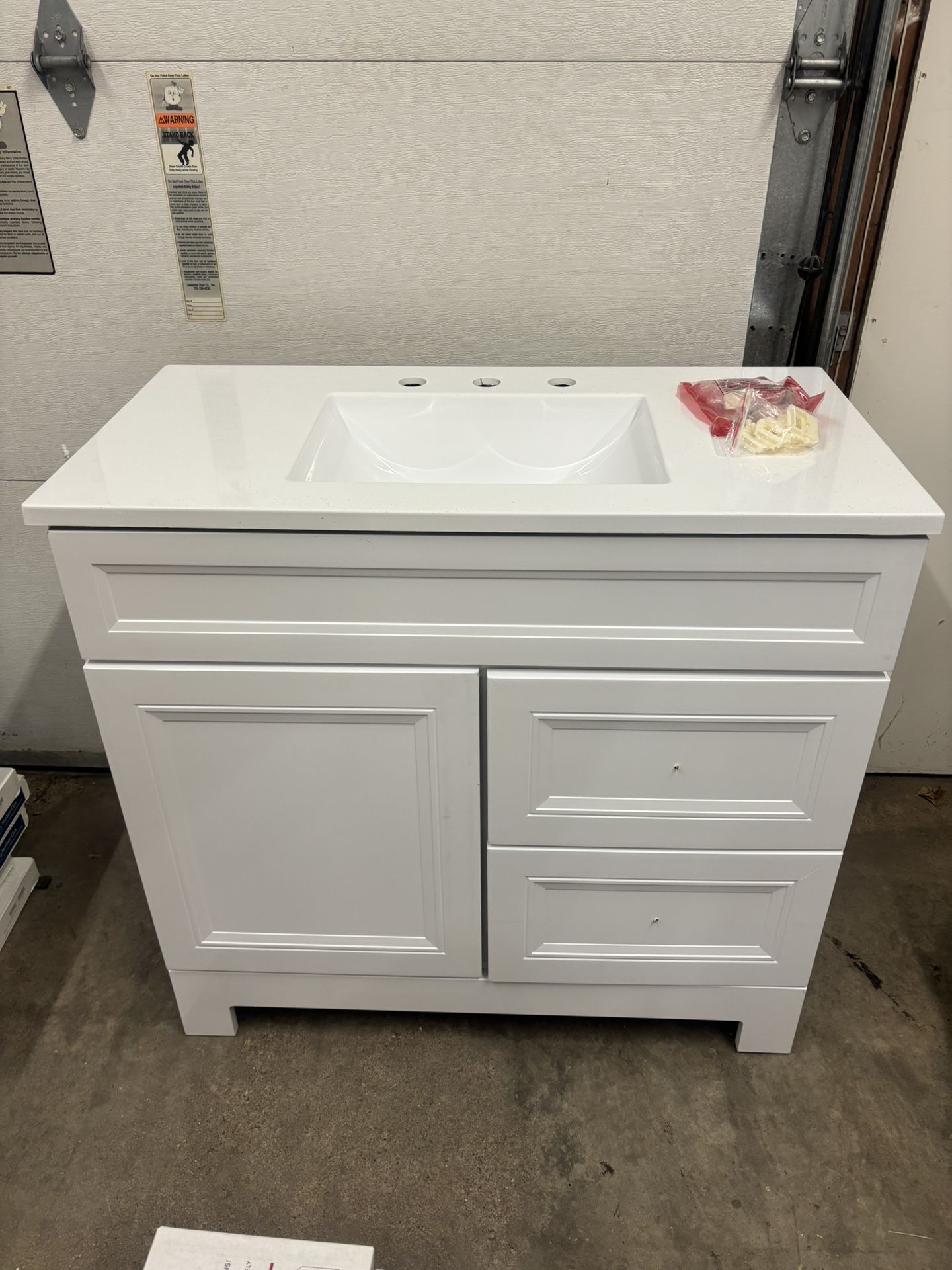 36.5” Bath Vanity Cabinet in White with Solid Surface Top (damaged)