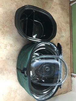 Rival Crock pot with warming jacket and extra two side cooker