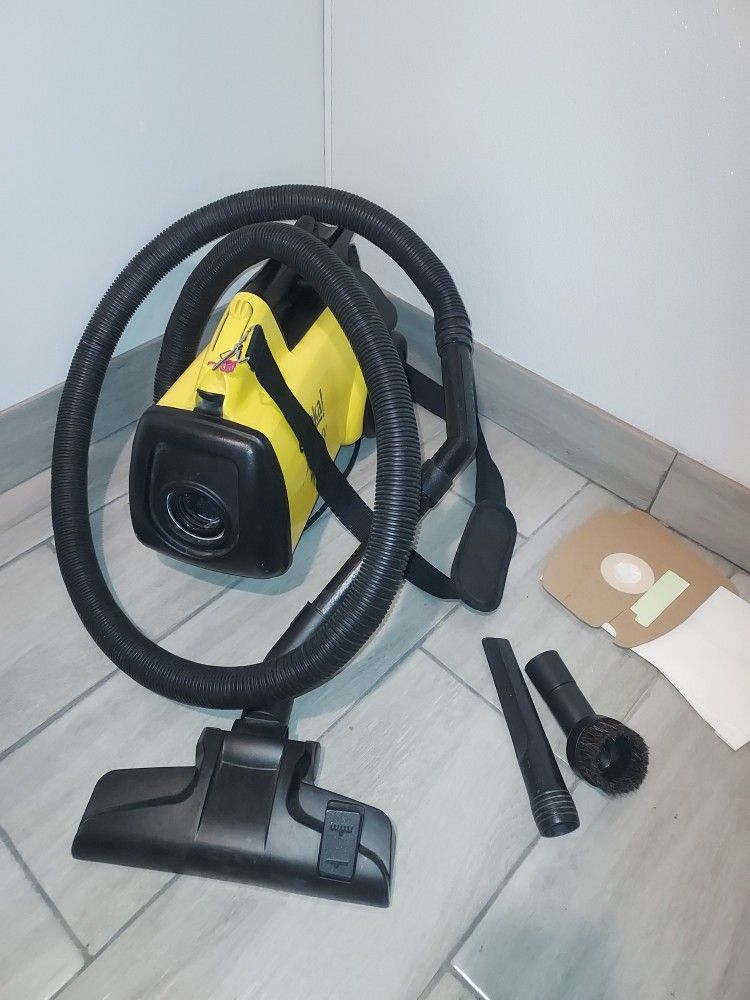 Eureka Sanitaire Mighty Mite Bag Commercial Vacuum Cleaner Assembly With Hose Assembly Wand Assembly And Attachment Shoulder Strap And Extra Bags Pic