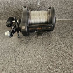 Shimano Triton TLD star drag fishing reel