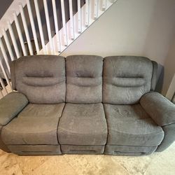 2 grey electric recliners