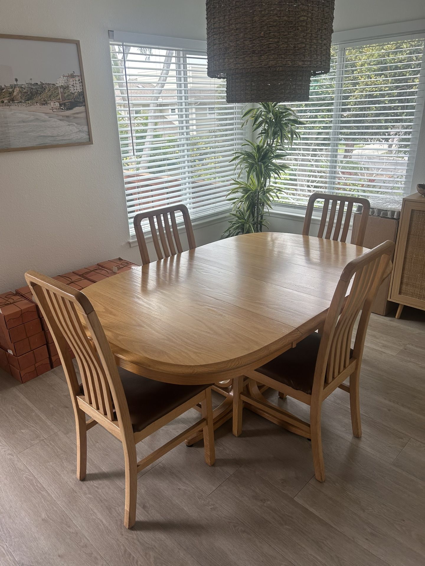 Dining Table + 4 Chairs – $200 (Total)