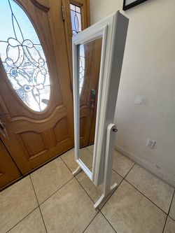 Jewelry storage mirror