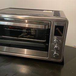 Portable Oven /toaster/ Bakes Broils 