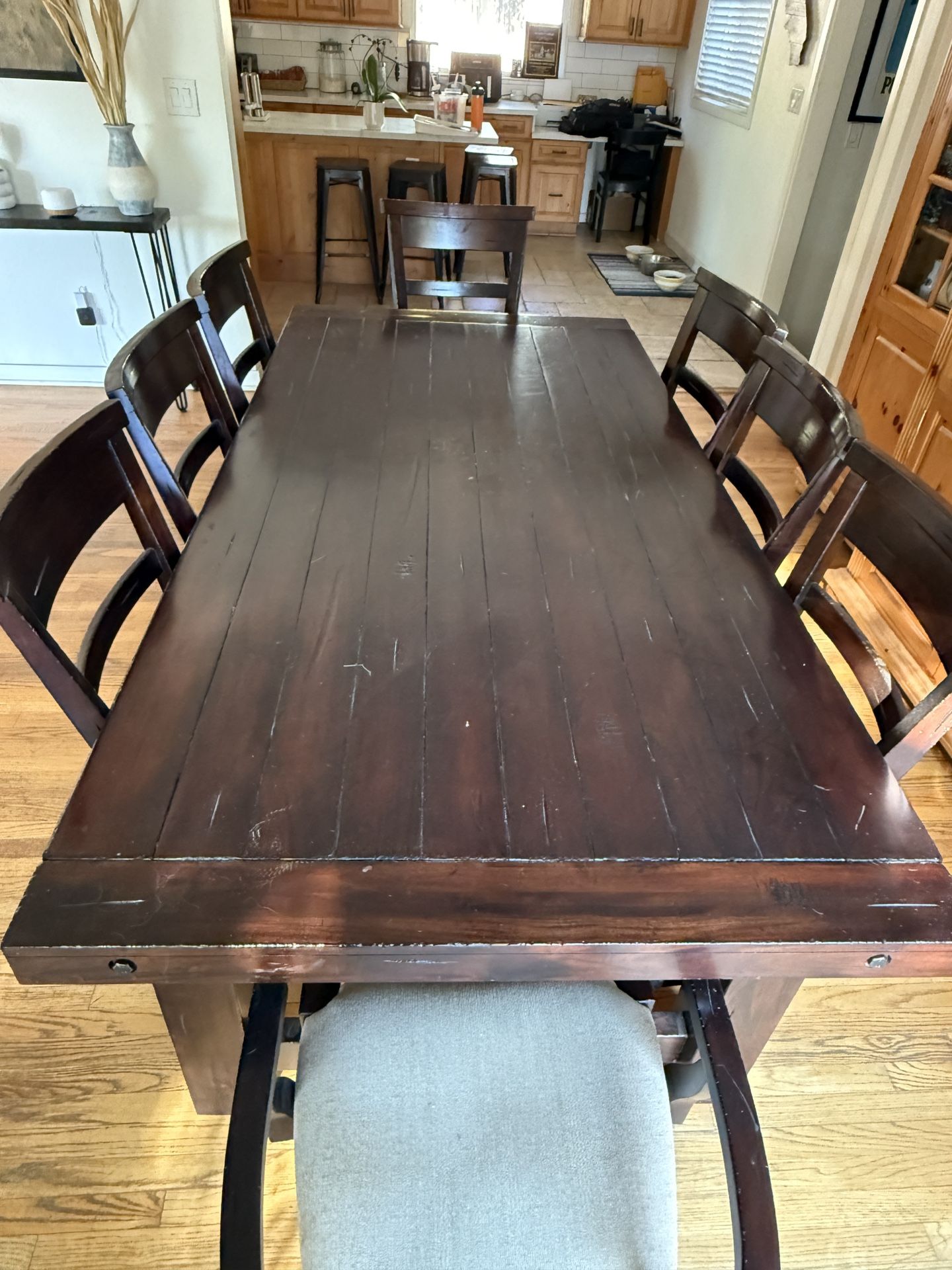 Solid wood distressed Dining Table w/ 8 chairs to match.