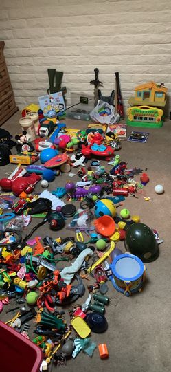 Very large assortment of kids toys with action figures and more. Large red tub is included.
