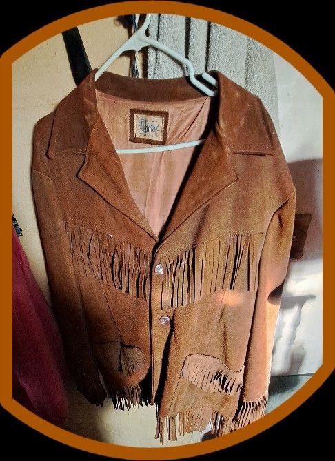 vintage Bufalo suede leather jacket with fringe details.